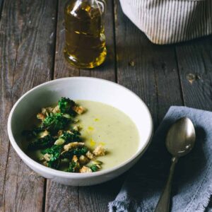 Potato leek soup on a table with canola oil