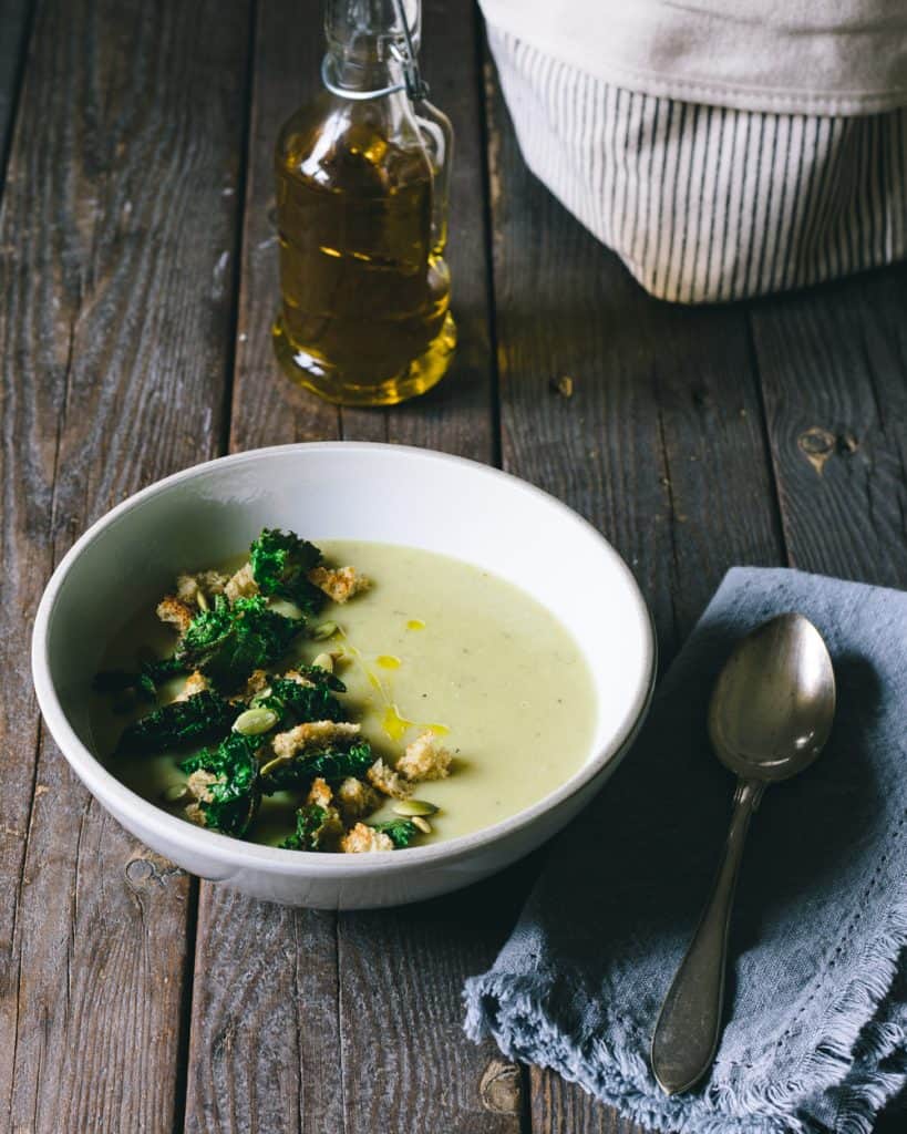 Potato leek soup on a table with canola oil