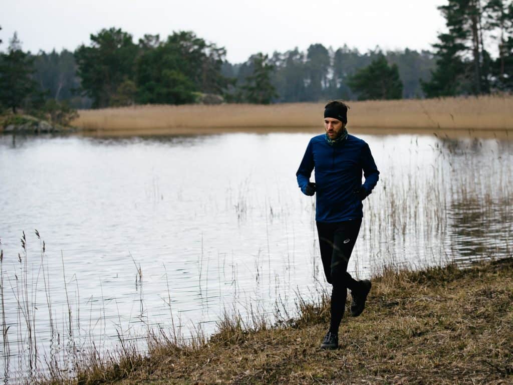 Man running by the water